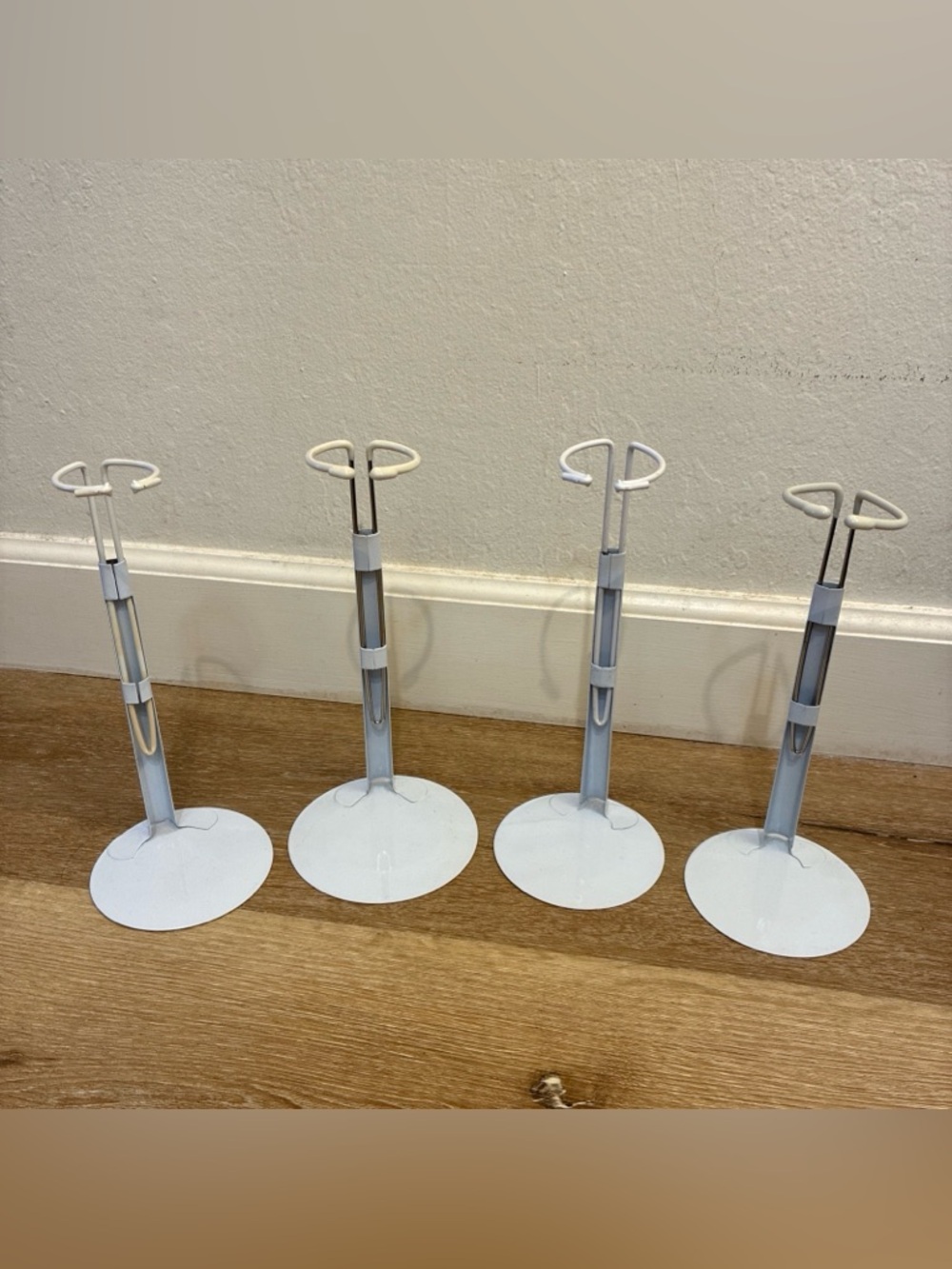 Lot 4 White Metal Stands Designed Display Dolls Action Figures

Good Condition